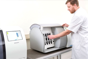 Photo showing a man using the Digital Lab Pathology Scanner